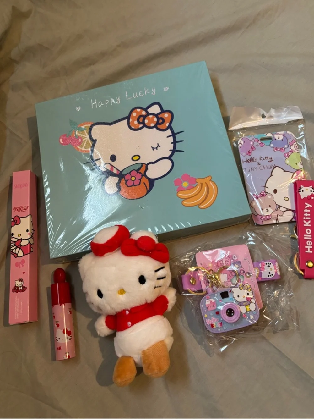 Hello Kitty Plush & Accessory Gift Set - Makeup palette, plush bag charm, & more